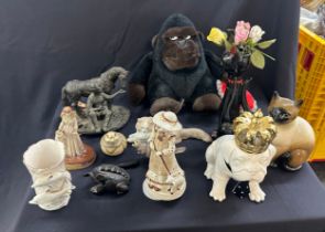 Selection of porcelain, wooden and resin animals, to include frog, dolphins crowned bulldog etc (