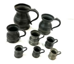 Selection of antique graduated pewter tankards