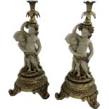 Pair resin candelabras, depicting cherubs, overall height of each 20 inches