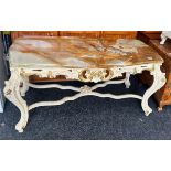 Onyx topped ornate coffee table measures approximately 23 inches tall 48.5 inches wide 26 inches