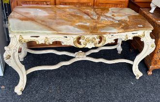 Onyx topped ornate coffee table measures approximately 23 inches tall 48.5 inches wide 26 inches