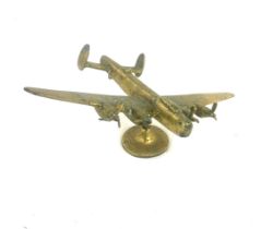 Brass aeroplane mascot measures approx 5 inches tall by 14 inches wide