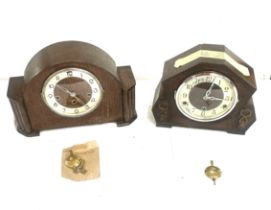 Two three key hole wooden mantel clocks one with key and pendulum the other pendulum only - both