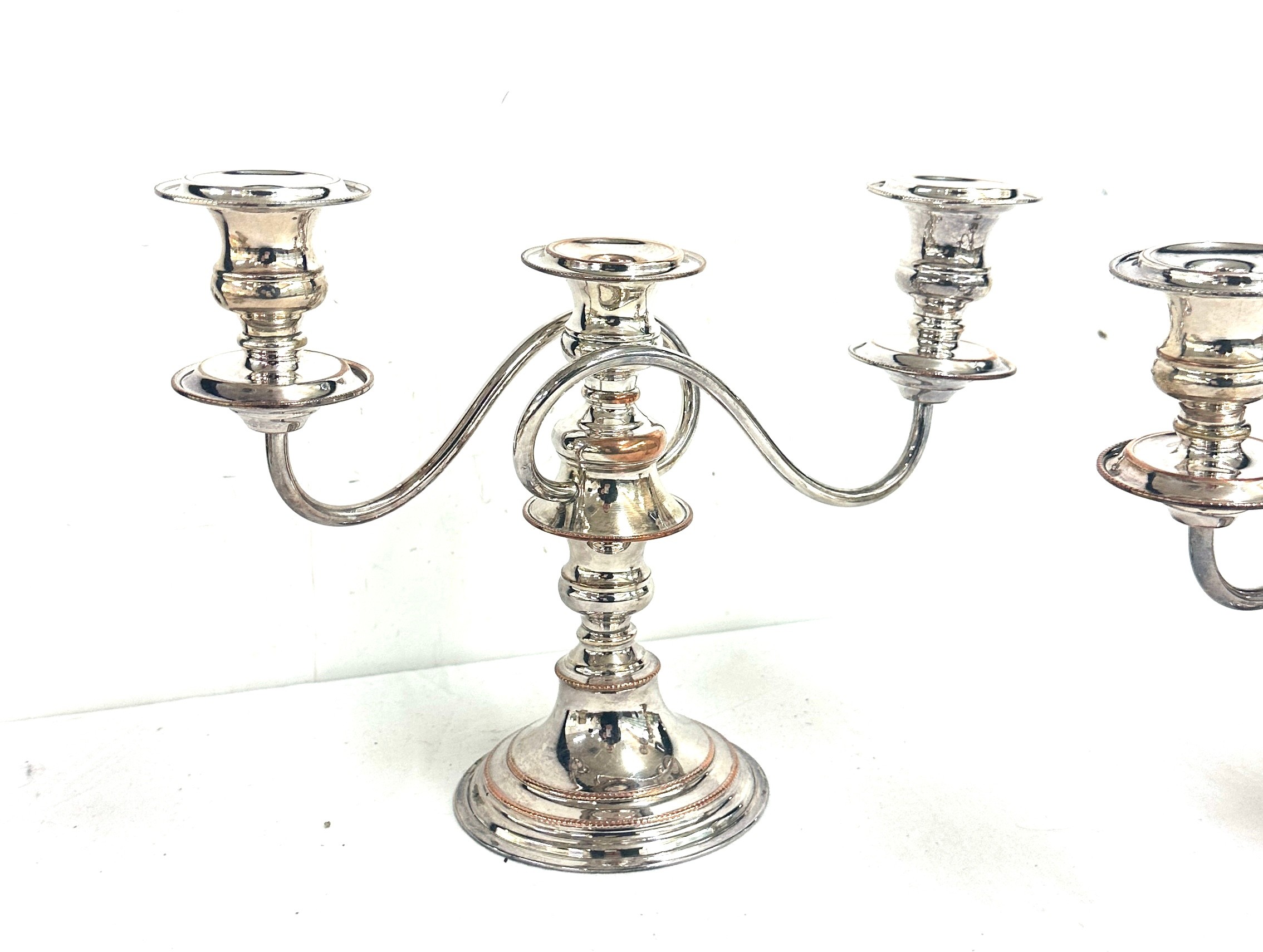 Two silver plated and copper candelabras measures approximately 9.5 inches tall by 12 wide - Image 3 of 5