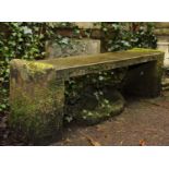 A stone church bench