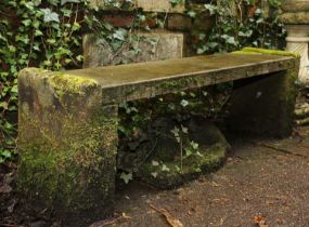 A stone church bench