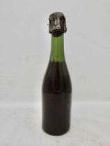 1 half-bottle 1950s Golden Guinea Champagne