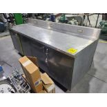 work bench w/ stainless steel top, approx. 31 in. x 92 in. c/w 3 in. bench vice and storage cabinets