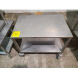 Table, stainless steel, casters, approx. 22 in. x 32 in. [Loc. Sanitation Room]