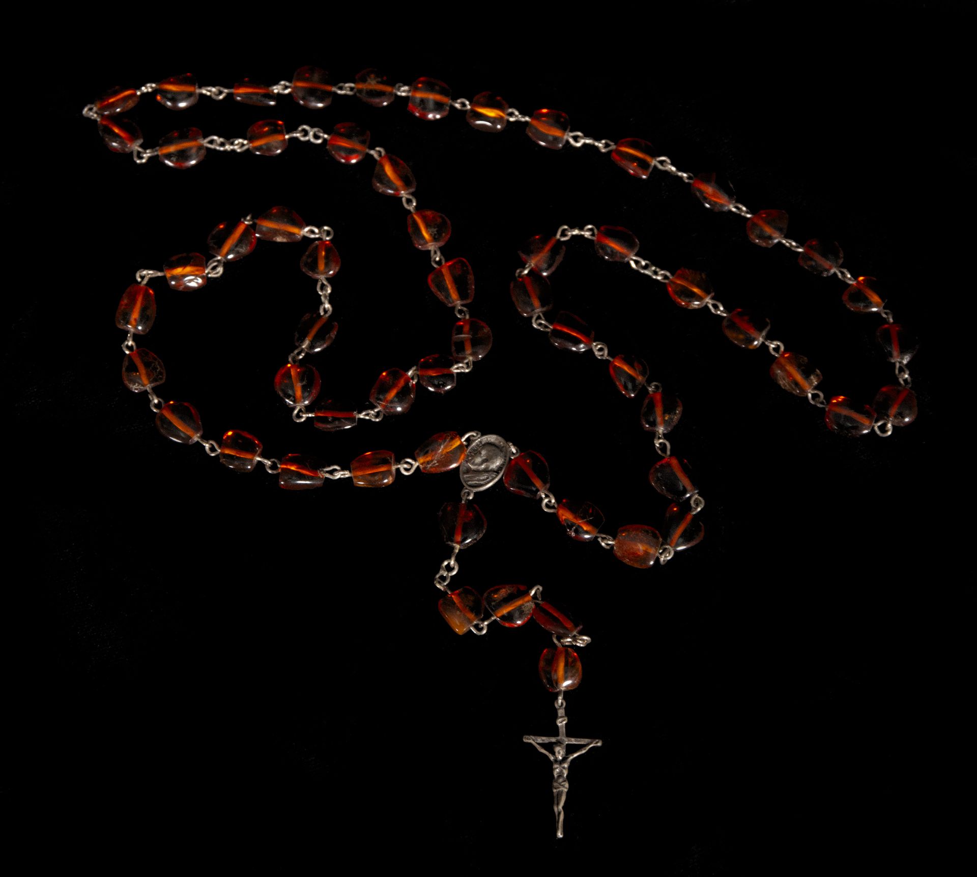 Rosary in sterling silver and amber, 19th C