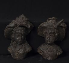 Pair of calamine busts of children, 19th century French school