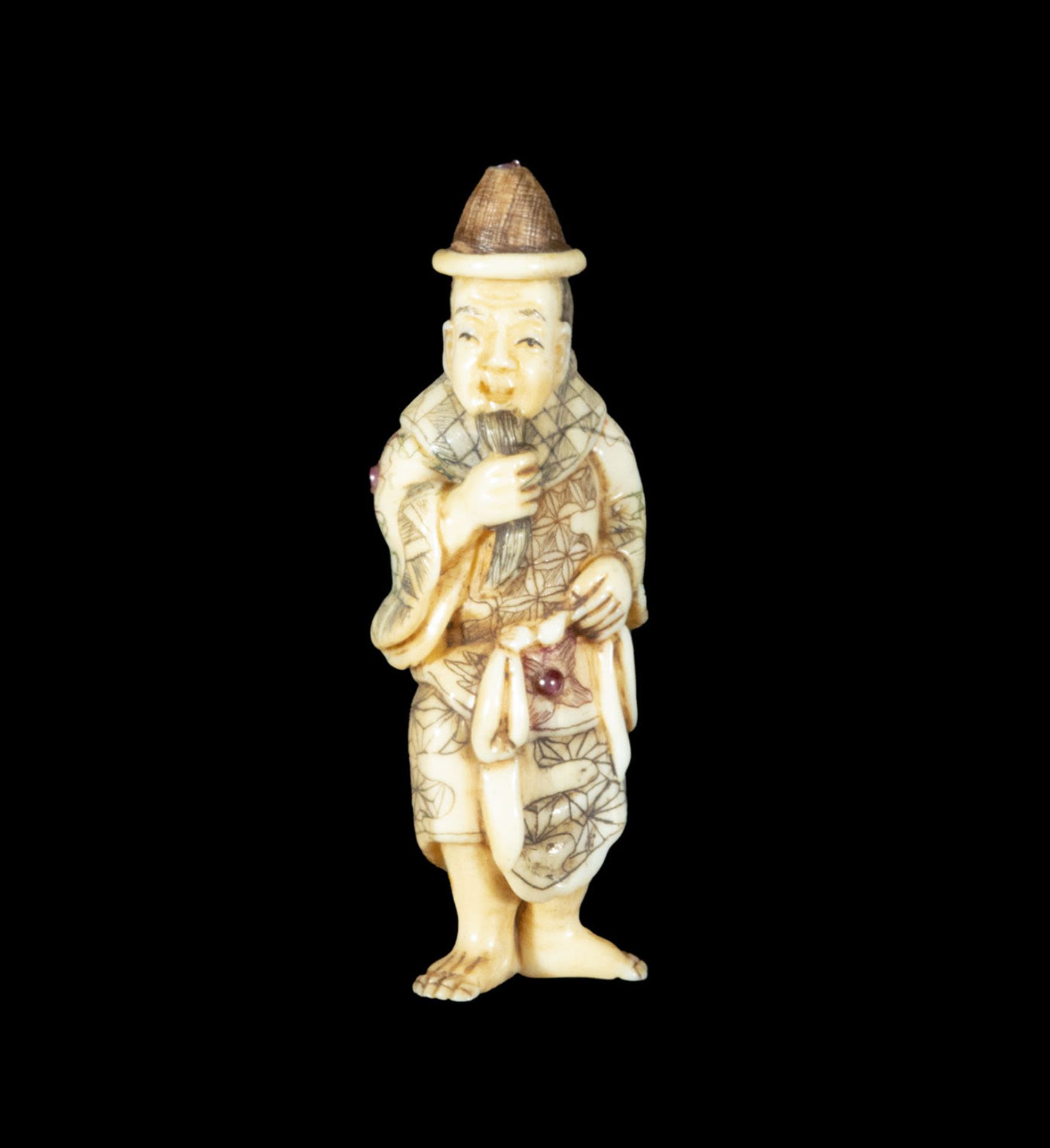 Japanese Netsuke on Mammoth Tusk (Mammuthus primigenius) representing old man with semiprecious ston