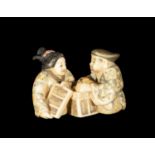 Japanese Netsuke on Mammoth Tusk (Mammuthus primigenius) representing elderly couple, 19th century J