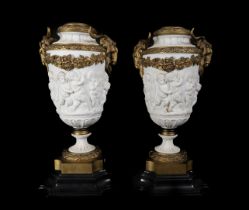 Pair of Vases in Biscuit tender porcelain and mercury gilded bronze, French work from the 19th centu