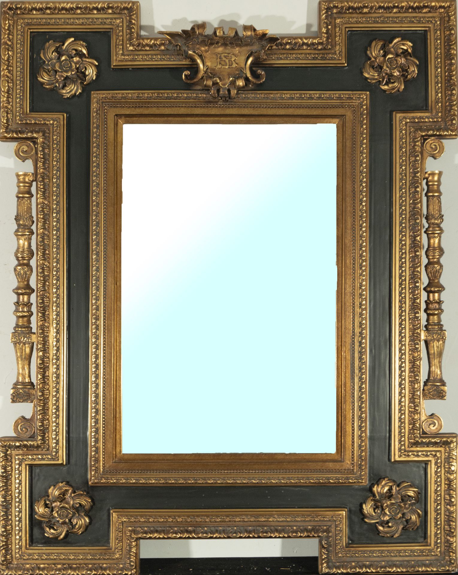 Large 19th century French mirror in gilded and ebonized wood