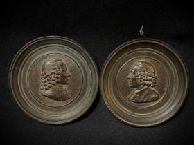 Pair of Elegant Grand Tour 19th century French Bronze Medallions representing Voltaire and Rousseau