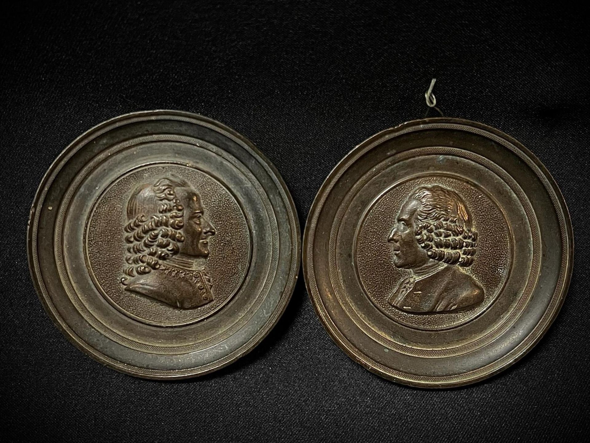 Pair of Elegant Grand Tour 19th century French Bronze Medallions representing Voltaire and Rousseau