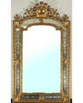 Large 19th century French mirror in gilded wood and stucco