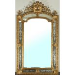 Large 19th century French mirror in gilded wood and stucco