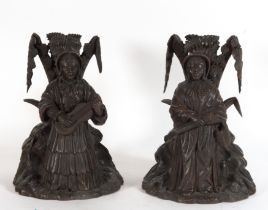 Rare pair of German Black Forest candlesticks from the early 19th century, in wood