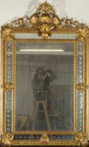 Large 19th century French mirror in gilded wood and stucco