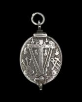 Silver Reliquary Medallion with Objects of the Passion. France, 17th century.