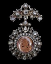 Exquisite diamond set devotional pendant with a micro sculpture. Spanish, c.1700.