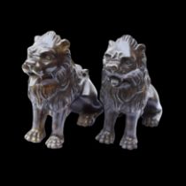 Matched pair of Renaissance bronze lions. Italian, 16th - 17th century.