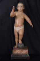 Wood carving sculpture of a boy, 18th century