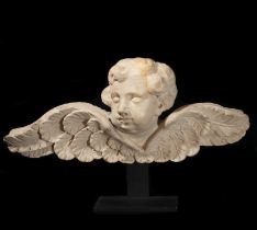 Marble angel's head, with opened wings, Italy, 18th century