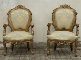 Pair of gilded armchairs, 18th - 19th centuries. Fouls.