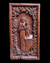 Hardwood relief with Saint Anthony and the Christ Child. Goa, 18th century.