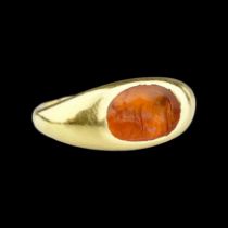 Roman carnelian ring with intaglio of a Cow and calf. 1st-2nd century AD.