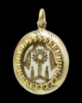 Charming little gold devotional pendant. Spanish, 19th century.