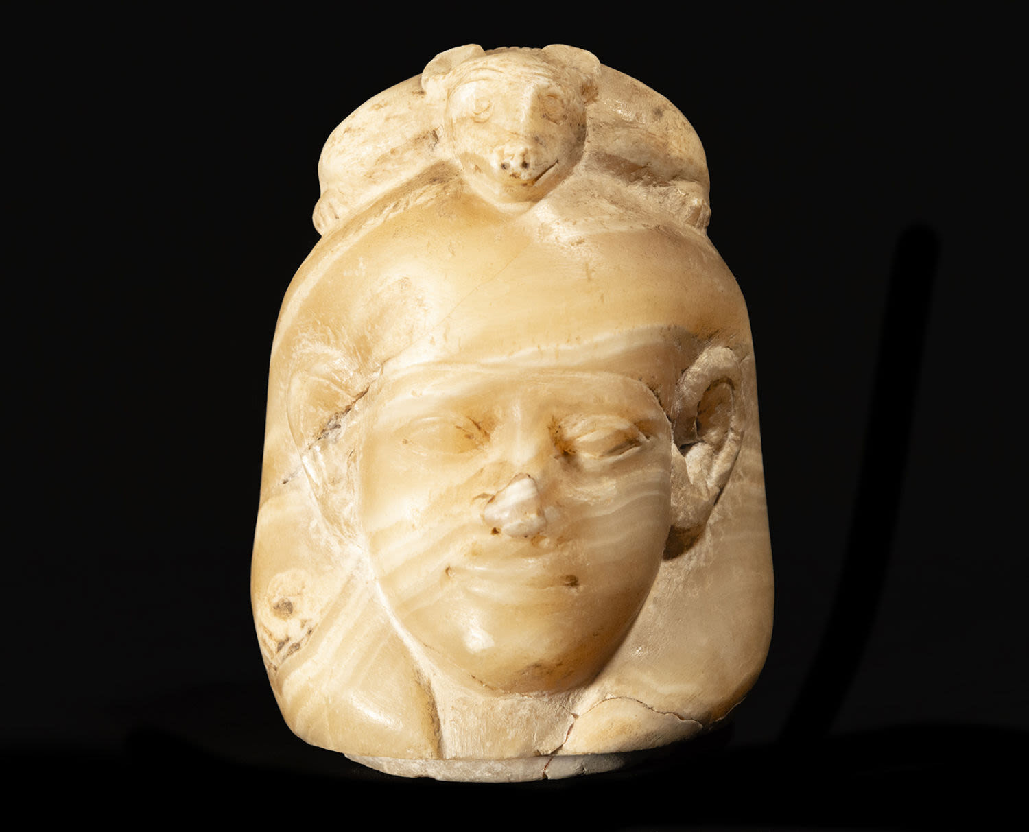 Rare Alabaster Canopic Vase Cover depicting the Goddess Abbas, possibly 1319-1307 BC, Late Egyptian 