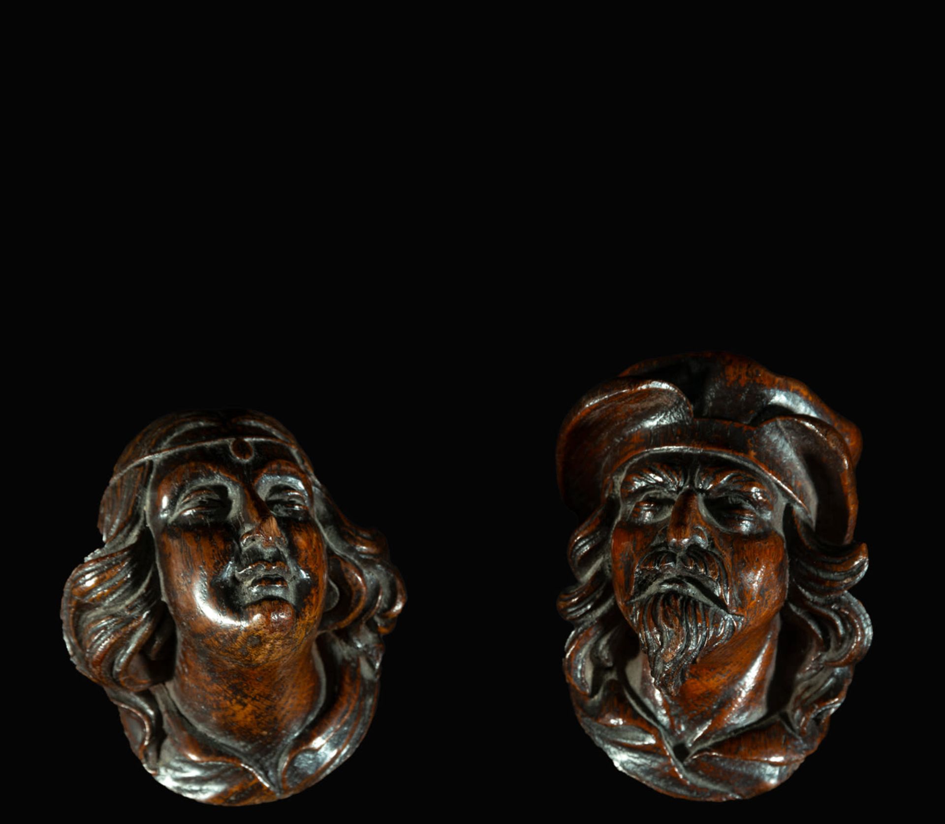 Pair of 18th century German Black Forest Applique Busts