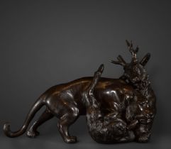 Beautiful bronze sculpture of a lion hunting a deer, 19th century