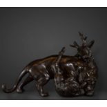 Beautiful bronze sculpture of a lion hunting a deer, 19th century