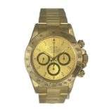 Exceptional Rolex Daytona "inverted 6" wristwatch in 18k solid gold. Brand new Rolex model 16528