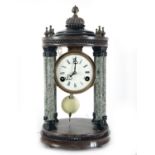 Bronze clock with green marble columns, XIX - XX centuries