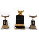 Charles X style garniture in obsidian and gilt bronze with pair of putti