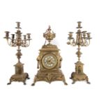 Garniture in gilt bronze with caryatids. Charles X style, 19th century