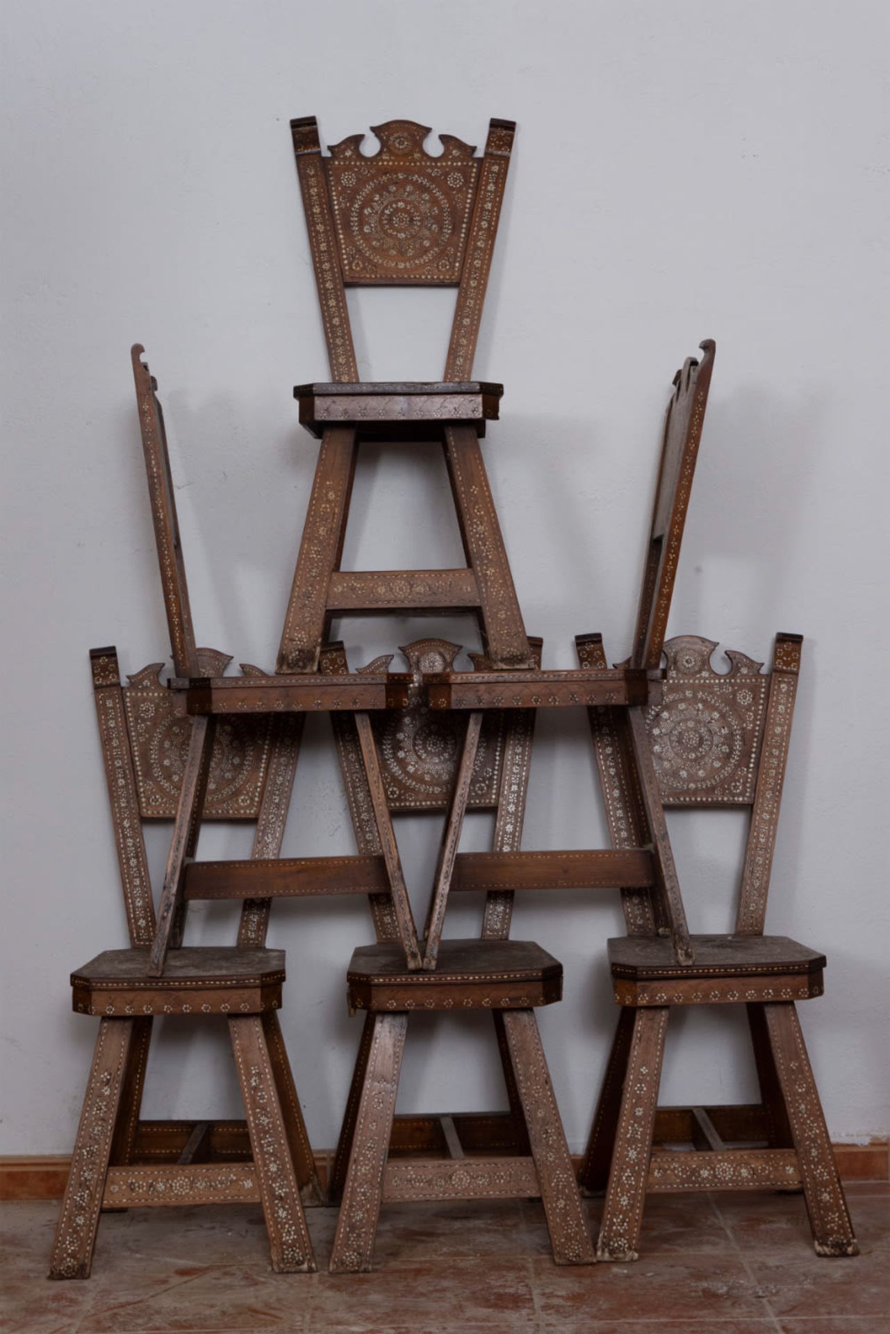 Lot of six chairs with bone inlays with geometric and floral decoration, 19th century