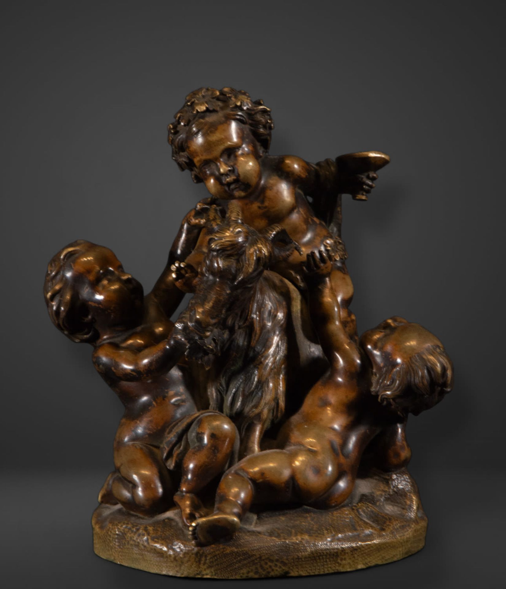 Allegorical bronze sculpture of Amours playing with a goat, 19th century