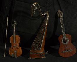 Set of three miniatures of musical instruments, 19th to 20th centuries