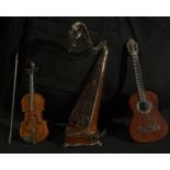 Set of three miniatures of musical instruments, 19th to 20th centuries