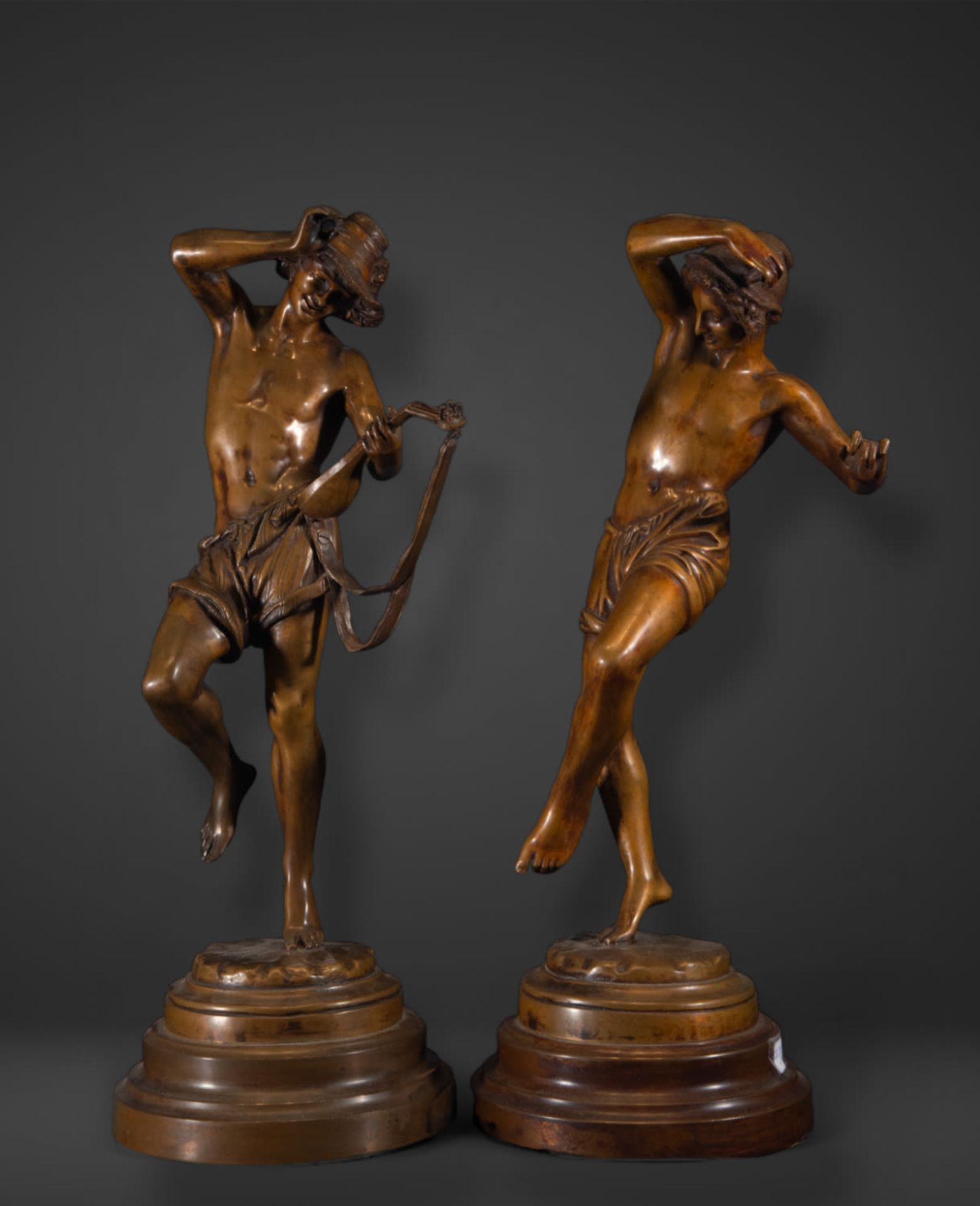 Pair of bronzes of a musician and dancer signed by Albert-Ernest Carrier Belleuse, 19th century