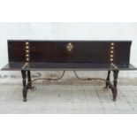 Baroque palace entrance bench with the Cross of Santiago and rivets in bronze and oak wood from the 