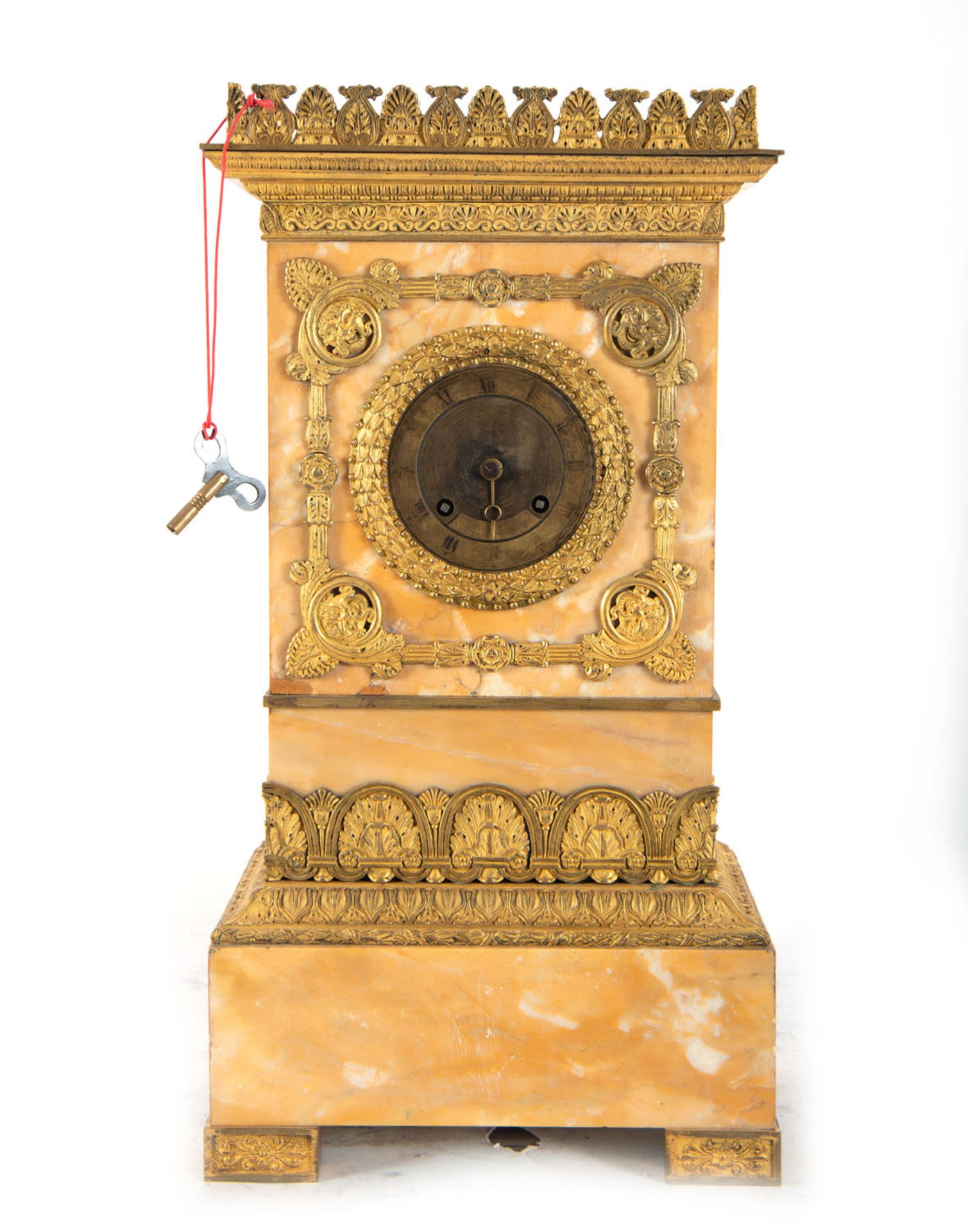 Pink marble and gilt bronze clock in the form of a portico. Charles X style, 19th century