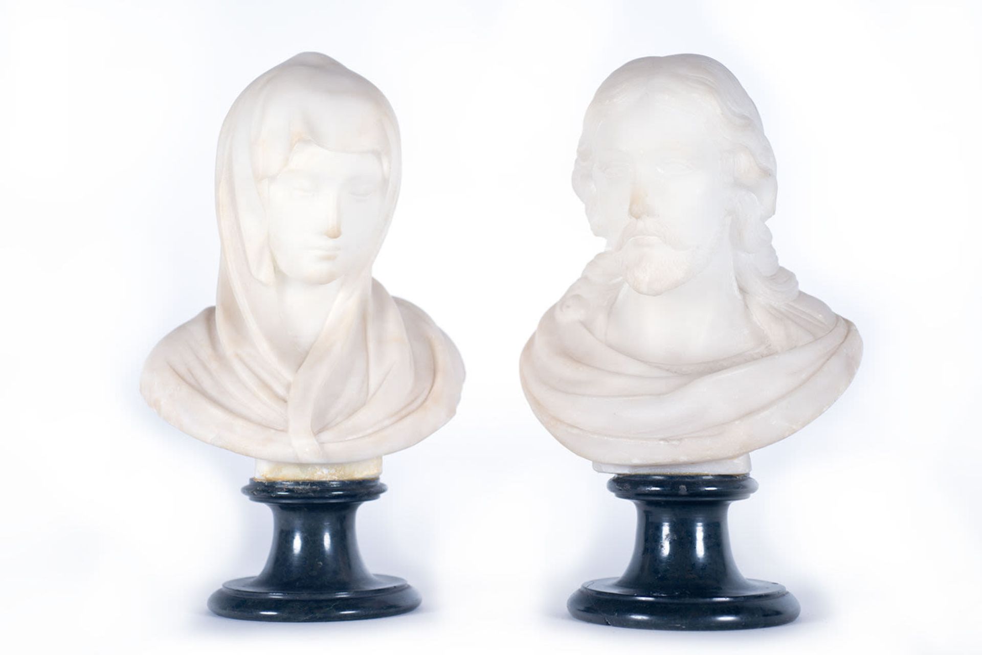Pair of Italian white marble busts of Christ and Mary